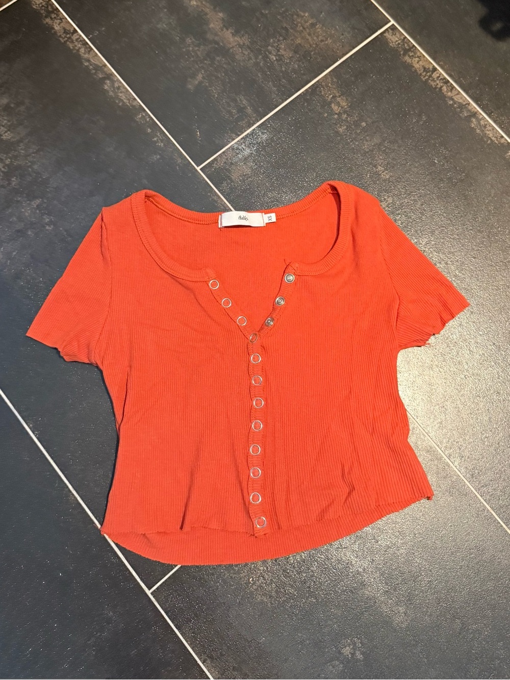 Adika women’s cropped orange baby tee with button details - Size XS